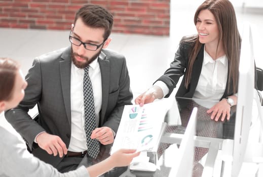 assistant passes business woman working document. office weekdays