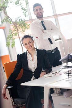 startup business couple portrait at modern bright office interior