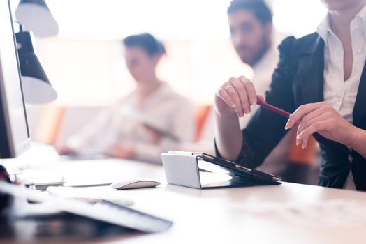 close-up of woman hands holding pen on business meeting