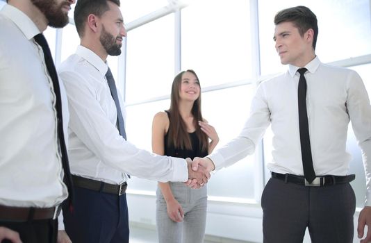 handshake between business colleagues in the office.concept of cooperation