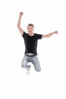 Happy excited cheerful young man jumping and celebrating success