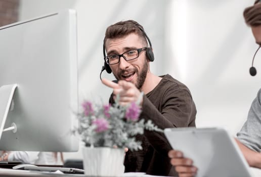 employee in the headset pointing at you. the concept of choice