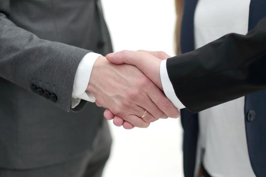 Two Confident businessman shake hands with each other