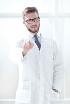 confident doctor therapist pointing at you .the concept of choice