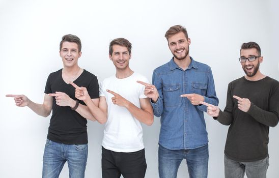 group of young people pointing at something.isolated on white background