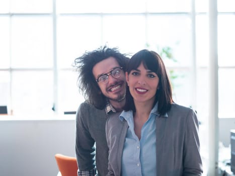 Portrait of startup business couple in a modern office