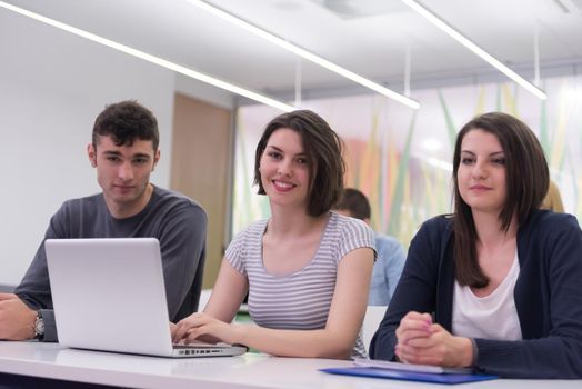 students group study together in school classroom and working together homework project