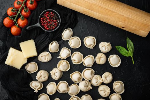 Tortellini ingredients set, on black background, top view flat lay