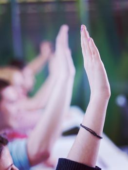 senior teacher teaching lessons, smart students group raise hands up in school  classroom on class