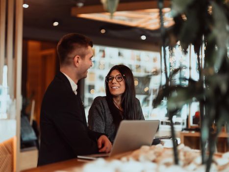 modern man and woman use modern devices, laptop, tablet and smartphone and arrange new projects for the job