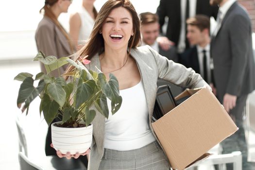 happy young business woman standing in new office.business concept