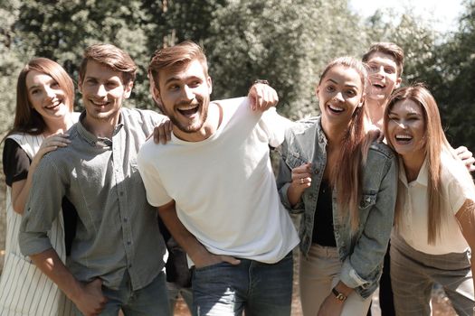 portrait of a group of friends on the background of the Park. lifestyle