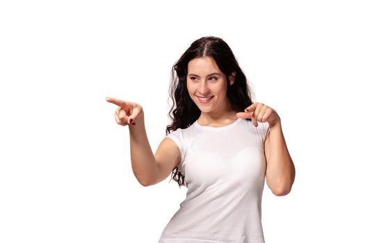 Girl points to someone the finger on the white background