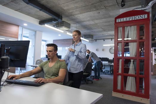 business couple working together on project at modern startup office