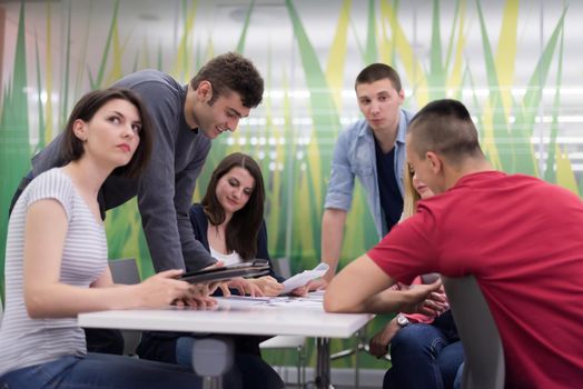 students group study together in school classroom and working together homework project