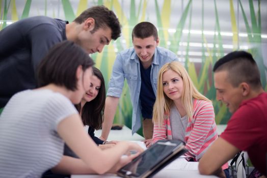 students group study together in school classroom and working together homework project