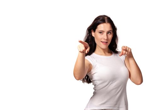 Girl points to someone the finger on the white background