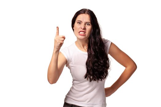 beautiful female model threatening with a finger on the white background
