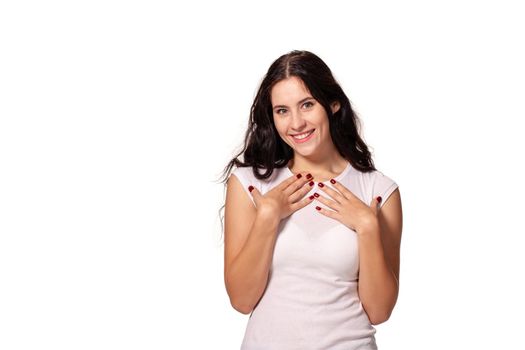 Beautiful young girl is pointing at herself to say am I on the white background