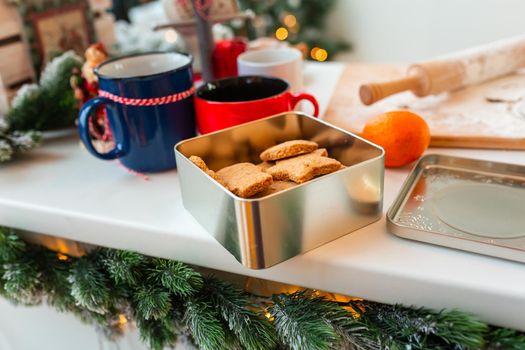 Christmas bakery. Friends making gingerbread, cutting cookies of gingerbread dough, view from above. Festive food, cooking process, family culinary, Christmas and New Year traditions concept