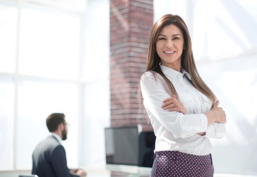 modern business woman on blurred office background.photo with copy space