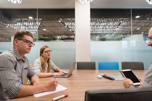 startup business team brainstorming on meeting   working on laptop and tablet computer