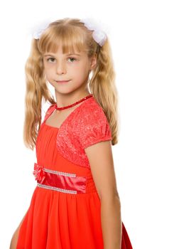 A very beautiful little girl with long, blonde ponytails on her head in a bright orange dress . close-up-Isolated on white background