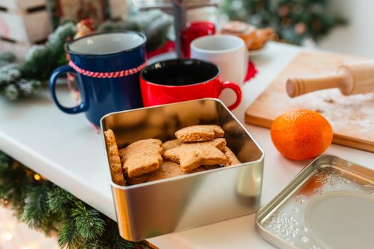 Christmas bakery. Friends making gingerbread, cutting cookies of gingerbread dough, view from above. Festive food, cooking process, family culinary, Christmas and New Year traditions concept