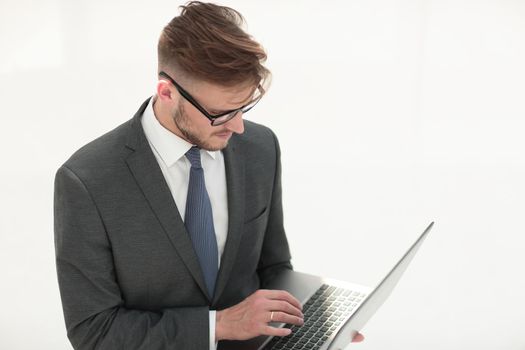 close up.businessman typing text on laptop.isolated on white