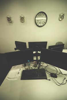 dual monitor screen and laptop computer at modern office indoors, startup company software develop  technology