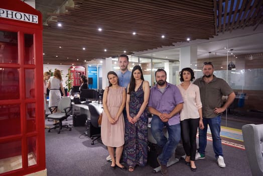 portrait of young successful startup business team at modern office indoors