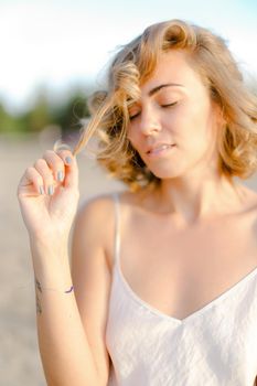 Close up portrait of young blonde cute woman without makeup. Concept of natural beauty and feamale person.