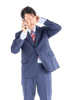 Young asian business men portrait holding phone in suit over white background