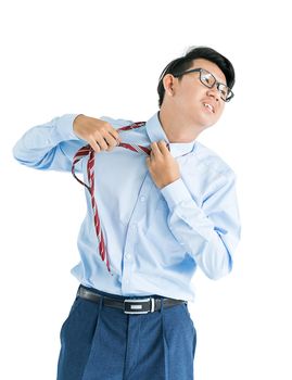 Male wearing blue shirt and red tie reaching hand out isolated on white background
