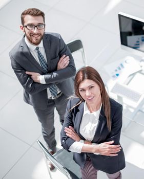 top view. three employees standing in the office. the concept of professionalism