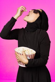 cheerful woman attractive look popcorn glasses movie watching isolated background. High quality photo