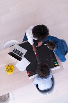 Multiethnic startup business team on meeting in modern bright office interior brainstorming, top view