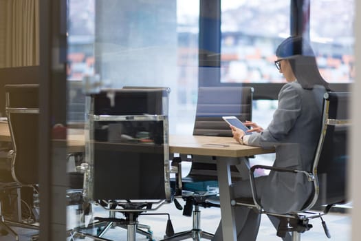 Businesswoman using tablet at the work in office