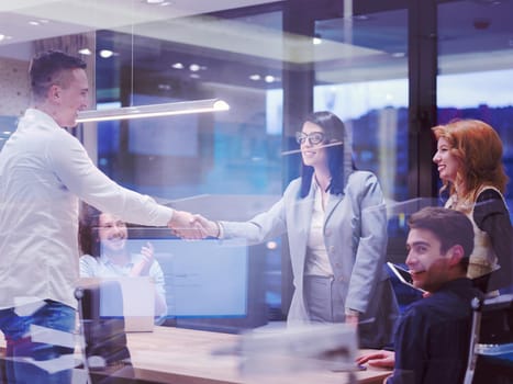 Business Partner Shake Hands on meetinig in modern office building