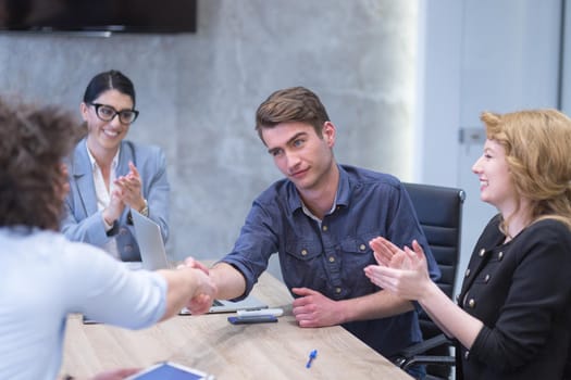 Business Partner Shake Hands on meetinig in modern office building