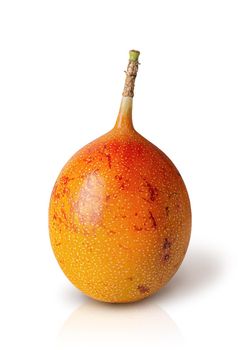 Whole tamarillo vertically isolated on a white background