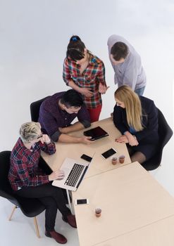 top view of multi ethnic startup business people group on brainstorming meeting in modern bright office interior