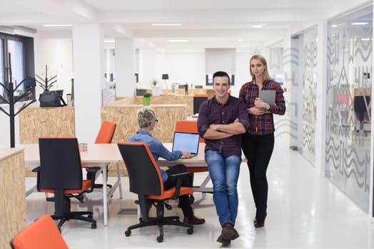 portrait of creative business people group in modern startup office interior