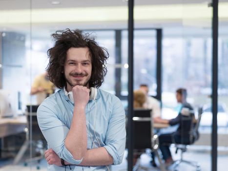 Portrait Of Successful Businessman Entrepreneur At Busy startup Office