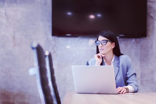 Young female Entrepreneur Freelancer Working Using A Laptop In Coworking space