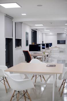 empty  startup office interior with modern computers and furniture