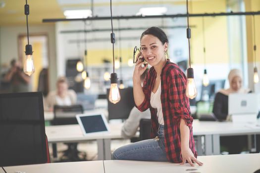 casual business woman at work  in creative modern coworking startup open space office