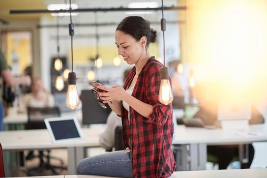 casual business woman at work  in creative modern coworking startup open space office