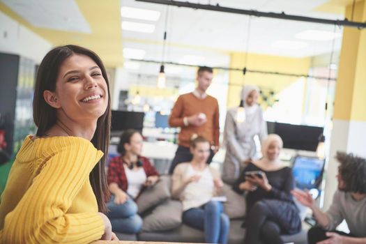 casual business woman at work  in creative modern coworking startup open space office