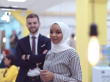 multiethnic startup business people team portrait at modern coworking open space office group of employees working in background